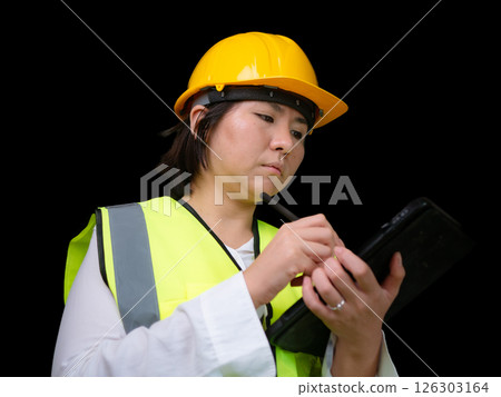 factory woman workers or technicians civil Engineer or Architecture project management using tablet at work. 126303164