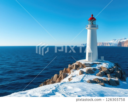 Snowy Coastal Lighthouse on a Winter Day Snowy Coastal Lighthouse on a Winter Day 126303758