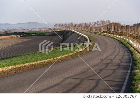 The road leading to the Tokachi Mountains The road leading to the Tokachi Mountains 126303767