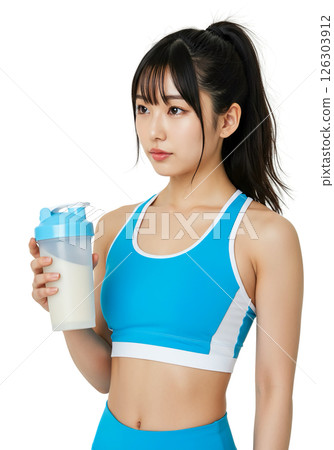 穿著運動服的女人拿著蛋白質搖晃器 — 健康的生活方式 穿著運動服的女人拿著蛋白質搖晃器 — 健康的生活方式 126303912