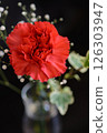 Red carnations and gypsophila 126303947