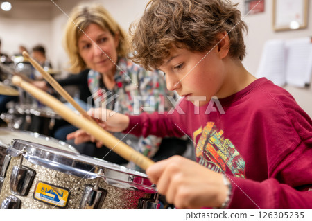 Young Drummer in Action Young Drummer in Action 126305235