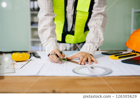 Close up of business people having consultation about wind energy at company office. on architectural project site 126305629