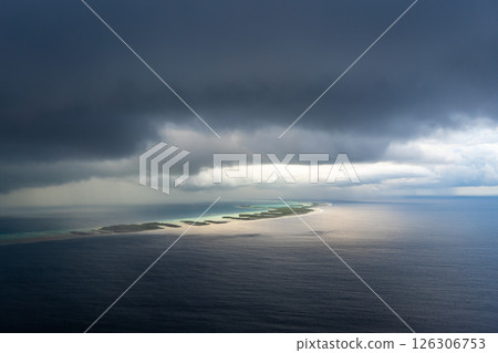 Aerial view of Rangiroa Atoll under a stormy sky, Tuamotus, French Polynesia 126306753