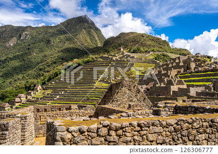 Panoramic view of Machu Picchu ruins with Huayna Picchu in background, Peru 126306777