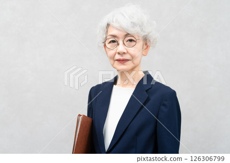 Senior woman in a business suit Business image Senior woman in a business suit Business image 126306799