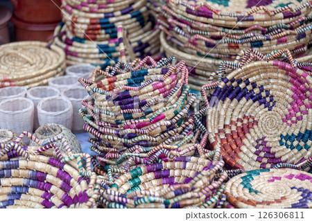 Handmade woven baskets and trays on a market stall Handmade woven baskets and trays on a market stall 126306811