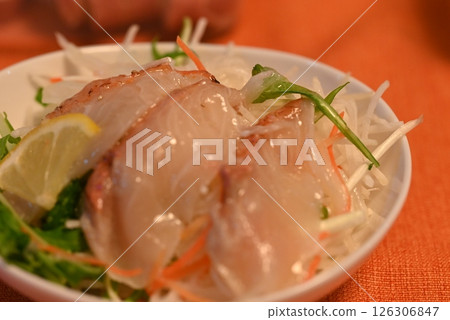 A luxurious salad topped with red snapper sashimi 126306847