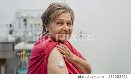 Portrait of lvoely elderly patient after vaccination. 126308711