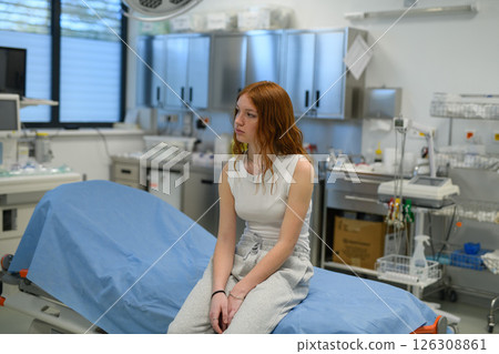 Teenage girl waiting for medical examination in hospital. 126308861