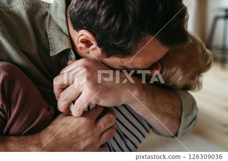 Playful father playing with little son, 126309036