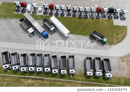 Parking of new and used trucks near the distribution and service center. Aerial view 126309479