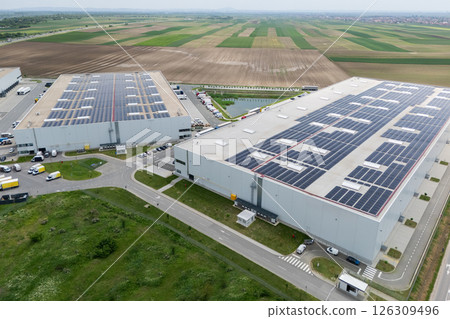 Logistics centers with solar panels on roofs. Aerial view Logistics centers with solar panels on roofs. Aerial view 126309496
