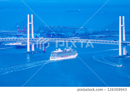 Yokohama cityscape in Japan. Two luxury cruise ships. Riviera departing. (Next is Diamond)...Queen in the back left... 126309943