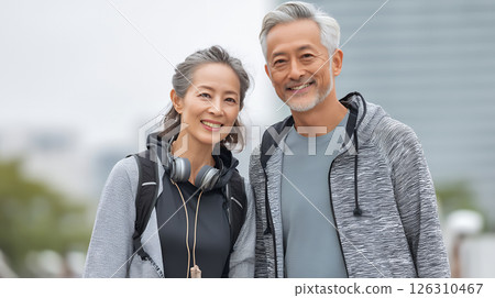 Middle-aged couple exercising together 126310467