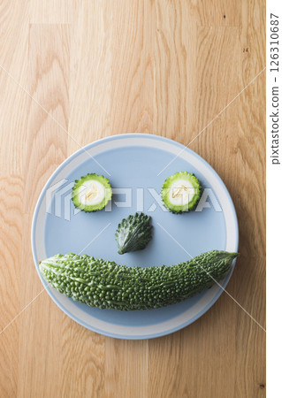 Bitter melon face 126310687