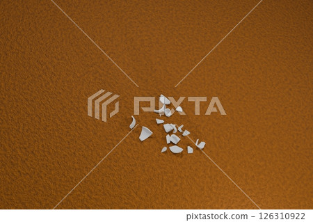 3DCG image of broken pieces of a white cup on a brown floor 126310922