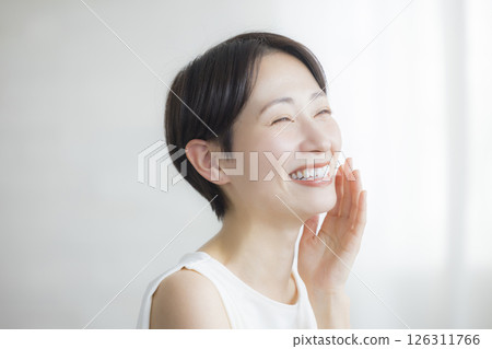 A woman who feels moisturized A woman who feels moisturized 126311766