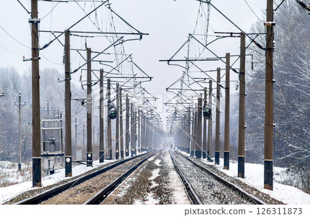 Railway tracks and signals in winter in Chernihiv Region of Ukraine 126311873