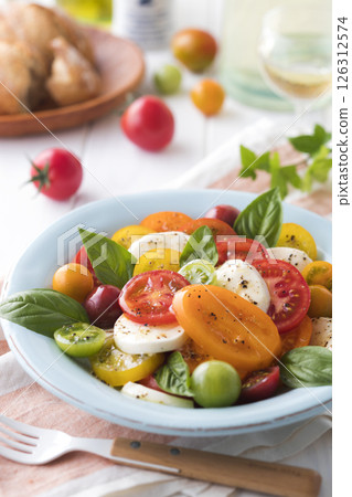 Tomato and mozzarella cheese salad 126312574