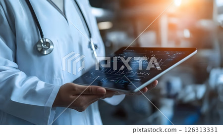 Close-up of physician holding tablet displaying ECG and patient data, advanced diagnostics in futuristic hospital setting, bright lighting, clean screen interface, 126313331