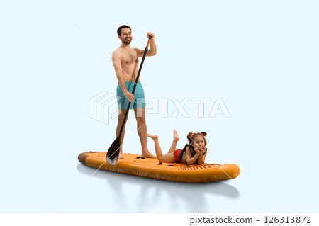 Father smiling and paddling on sup board with his daughter child lying down relaxed in life jacket against neutral studio background. Father smiling and paddling on sup board with his daughter child lying down relaxed in life jacket against neutral studio background. 126313872