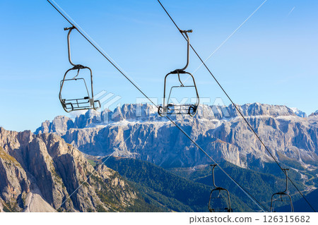 Empty ski lift in off-season repose, Italy Seceda Empty ski lift in off-season repose, Italy Seceda 126315682