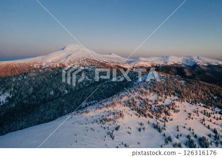 Winter aerial landscape of majestic Carpathian mountains. Background with sunset 126316176