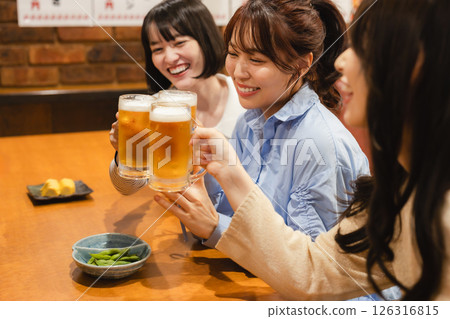 A woman toast to a pub 126316815