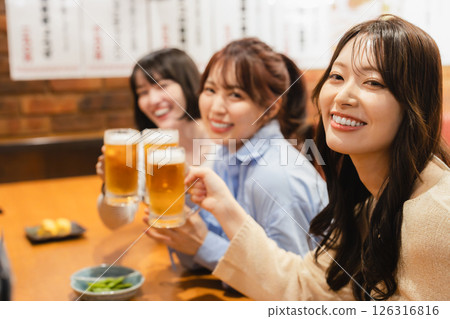 A woman drinking alcohol 126316816