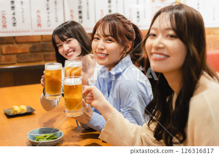 A woman drinking alcohol A woman drinking alcohol 126316817