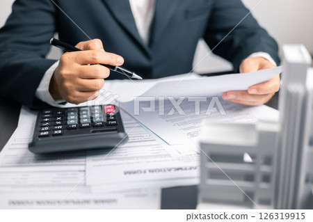 Finance bank tax expense accounting budget money businessman home for Business expense analysis saving use Financial calculate accountant close up calculator with graph chart hand write office desk Finance bank tax expense accounting budget money businessman home for Business expense analysis saving use Financial calculate accountant close up calculator with graph chart hand write office desk 126319915