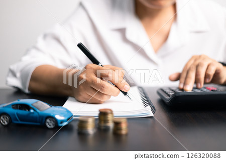 Finance bank tax expense accounting budget money businessman hand for Business expense analysis saving use car Financial calculate accountant close up calculator with graph chart write office desk Finance bank tax expense accounting budget money businessman hand for Business expense analysis saving use car Financial calculate accountant close up calculator with graph chart write office desk 126320088