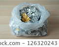 Plastic Bag Filled with Orphan Pharmaceutical Blister Packs 126320243