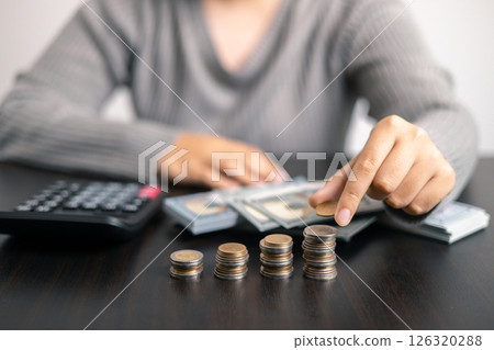 Finance bank tax expense accounting budget money businessman hand use calculator Financial calculate accountant close up calculator with graph chart write office desk Business expense analysis saving Finance bank tax expense accounting budget money businessman hand use calculator Financial calculate accountant close up calculator with graph chart write office desk Business expense analysis saving 126320288