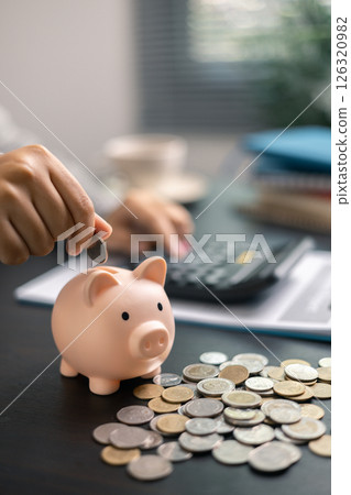 Finance bank tax expense accounting budget money businessman hand use calculator Financial calculate accountant close up calculator with graph chart write office desk Business expense analysis saving Finance bank tax expense accounting budget money businessman hand use calculator Financial calculate accountant close up calculator with graph chart write office desk Business expense analysis saving 126320982