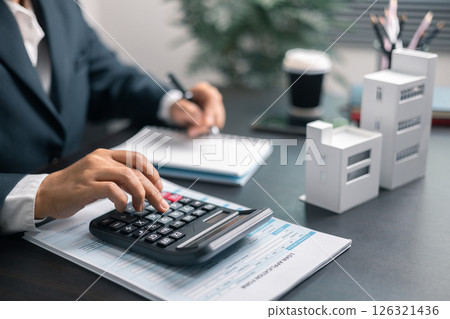 Finance bank tax expense accounting budget money businessman home for Business expense analysis saving use Financial calculate accountant close up calculator with graph chart hand write office desk Finance bank tax expense accounting budget money businessman home for Business expense analysis saving use Financial calculate accountant close up calculator with graph chart hand write office desk 126321436