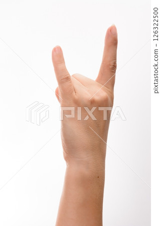 Hand making rock and roll gesture on white background Hand making rock and roll gesture on white background 126322500