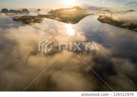 Drone aerial view of landscape fog over mountains in sunrise sky,High angle view over countryside at Southeast asia,Phang Nga Thailand,Wide angle view nature landscape 126322976