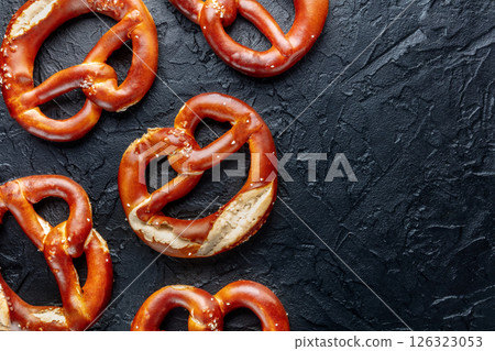Pretzel or Bretzel, traditional German beer snack, a salty wheat bread Pretzel or Bretzel, traditional German beer snack, a salty wheat bread 126323053