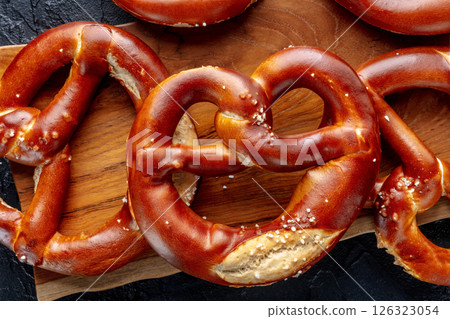 Pretzel or Bretzel, traditional German beer snack, a salty wheat bread Pretzel or Bretzel, traditional German beer snack, a salty wheat bread 126323054