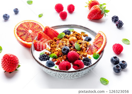 Granola with yogurt and fresh fruit. Organic gourmet muesli with ingredients Granola with yogurt and fresh fruit. Organic gourmet muesli with ingredients 126323056