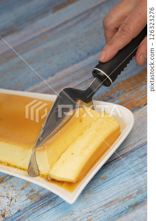 Cream caramel pudding with caramel sauce on a plate, Flan Cream caramel pudding with caramel sauce on a plate, Flan 126323276