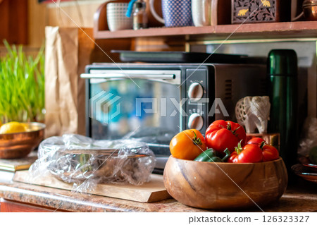 Cooking in the kitchen, the concept of healthy food and nutrition Cooking in the kitchen, the concept of healthy food and nutrition 126323327