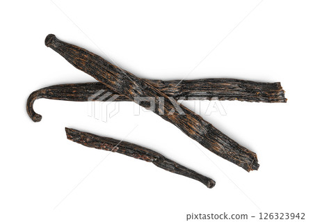 Dried vanilla stick isolated on white background. Top view. Flat lay. Dried vanilla stick isolated on white background. Top view. Flat lay. 126323942