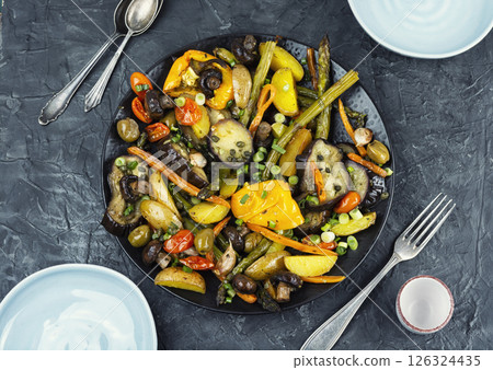 Roasted hot vegetables on a plate. Roasted hot vegetables on a plate. 126324435