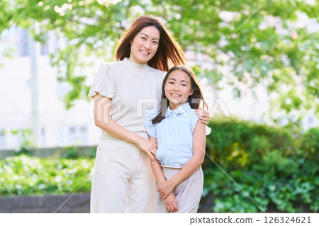 Smiling mother and daughter portrait Smiling mother and daughter portrait 126324621