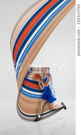 Dynamic image of female basketball player in motion with ball on white background with abstract colorful design element. Pixel stretch effect. Dynamic image of female basketball player in motion with ball on white background with abstract colorful design element. Pixel stretch effect. 126324789
