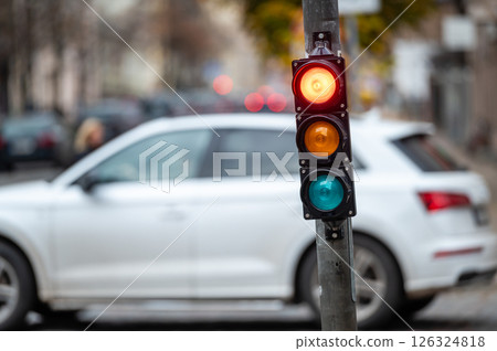 traffic light on the street junction with beautiful bokeh, city with cars in the background traffic light on the street junction with beautiful bokeh, city with cars in the background 126324818