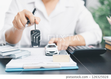 Businesswoman hand stamp approve on financial business approval document paper. Man hand accept permit contract agreement. Broker manager sign contract bank guarantee approved stamp application form 126325028